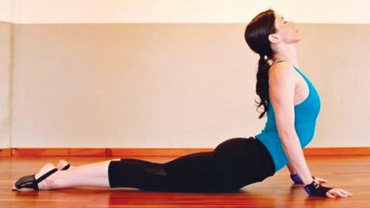 বাড়িতেই করুন যোগাভ্যাস – আজকের আসন ভুজঙ্গাসন